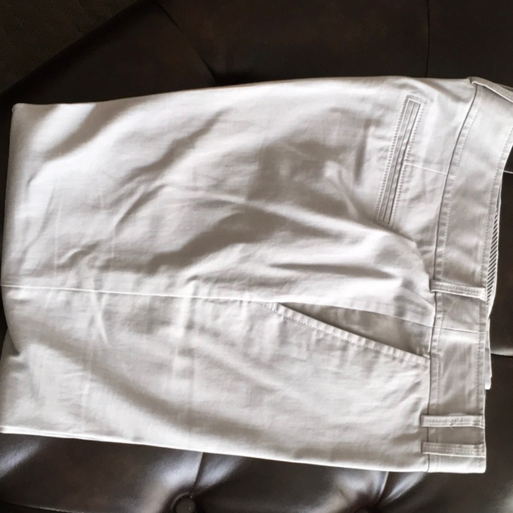 Silver/Grey with thin white pin stripe crop pants.